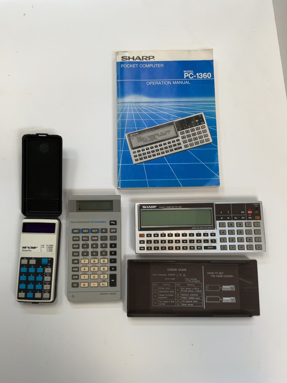 Lot 317: A Collection of Three Vintage Calculators and a...