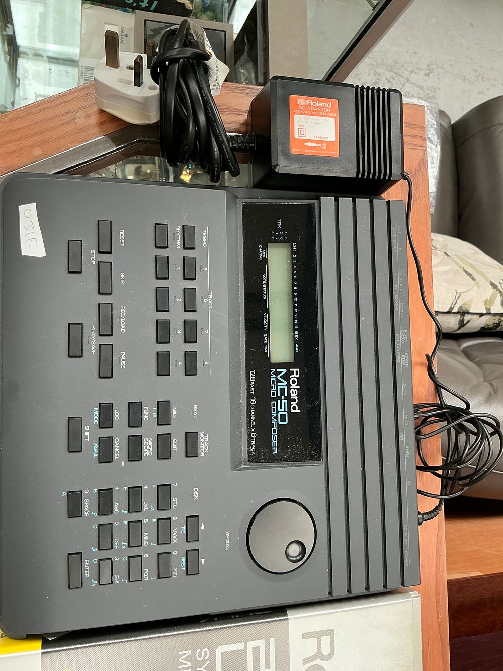 Lot 323: Roland MC-50 Micro Composer MIDI Sequencer with AC...