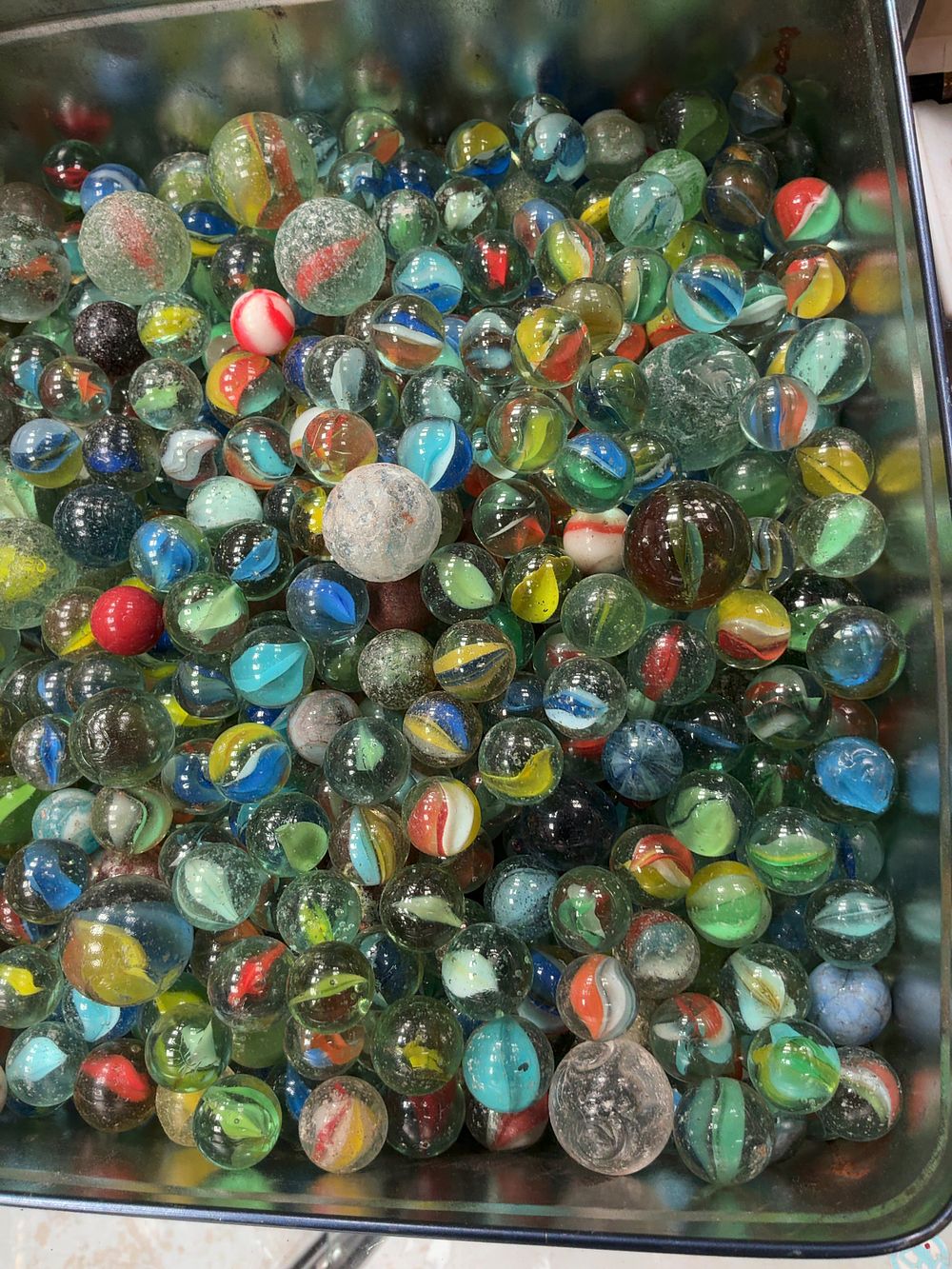 Lot 331: A Collection of Assorted Glass and Stone Marbles...