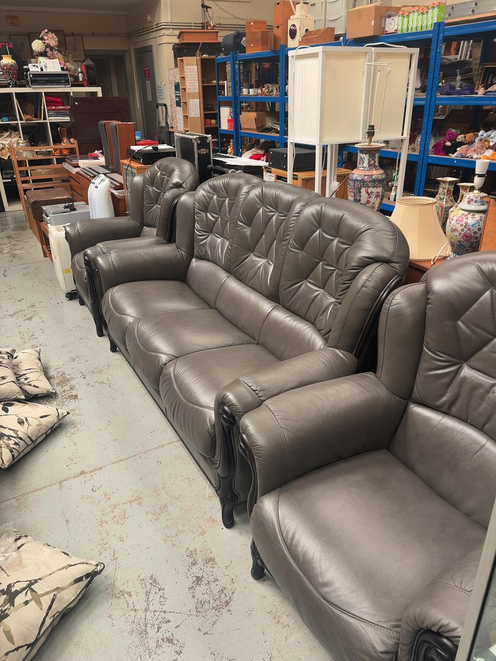 Lot 336: A Three-Piece Traditional Style Lounge Suite in Charcoal...