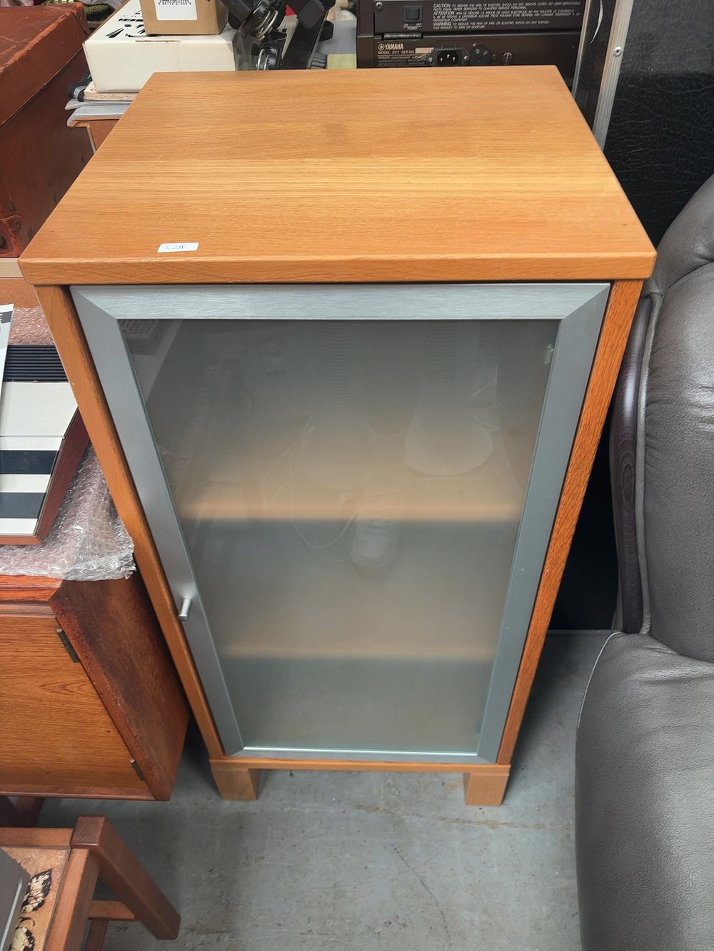 Lot 339: A Contemporary Light Wood Veneered Pedestal Cabinet with...