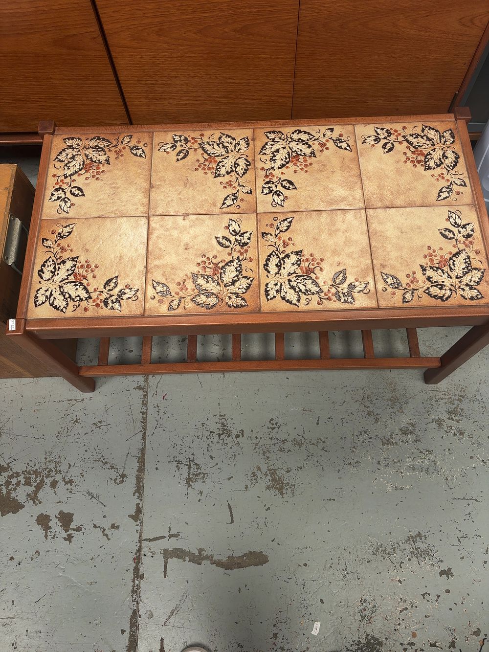 Lot 341: A Mid-Century Modern Teak Coffee Table with Ceramic...
