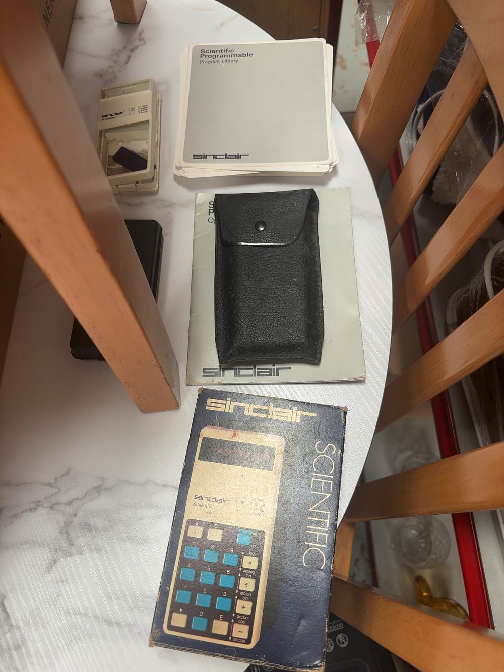 Lot 377: A Collection of Vintage Sinclair Scientific Calculators and...