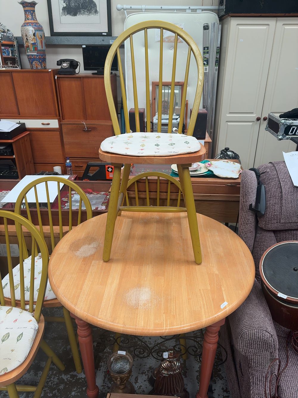 Lot 392: A Round Natural Wood Kitchen Table and 4...