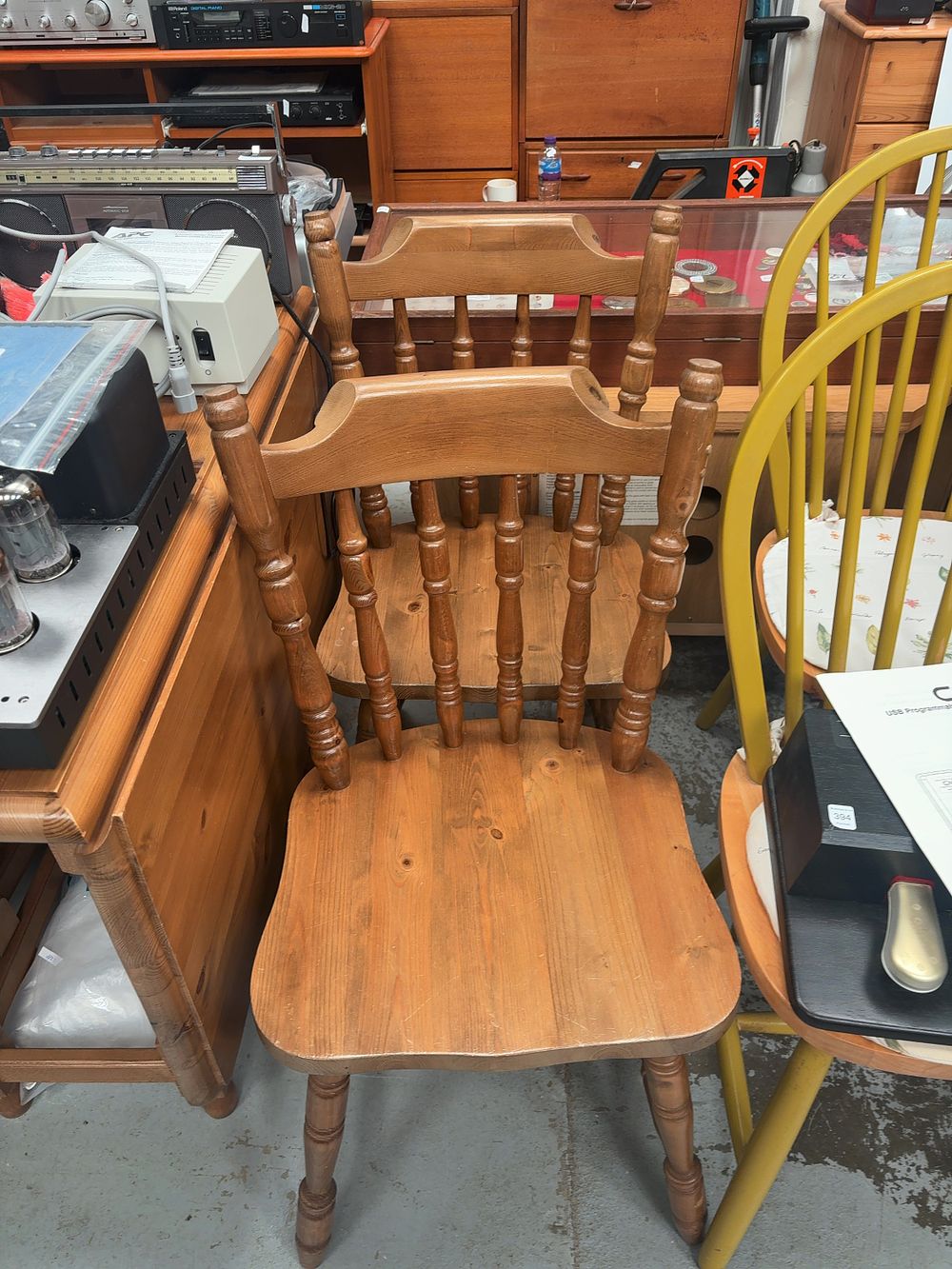 Lot 395: Solid Wood Drop-Leaf Table and Two Spindle-Back Chairs