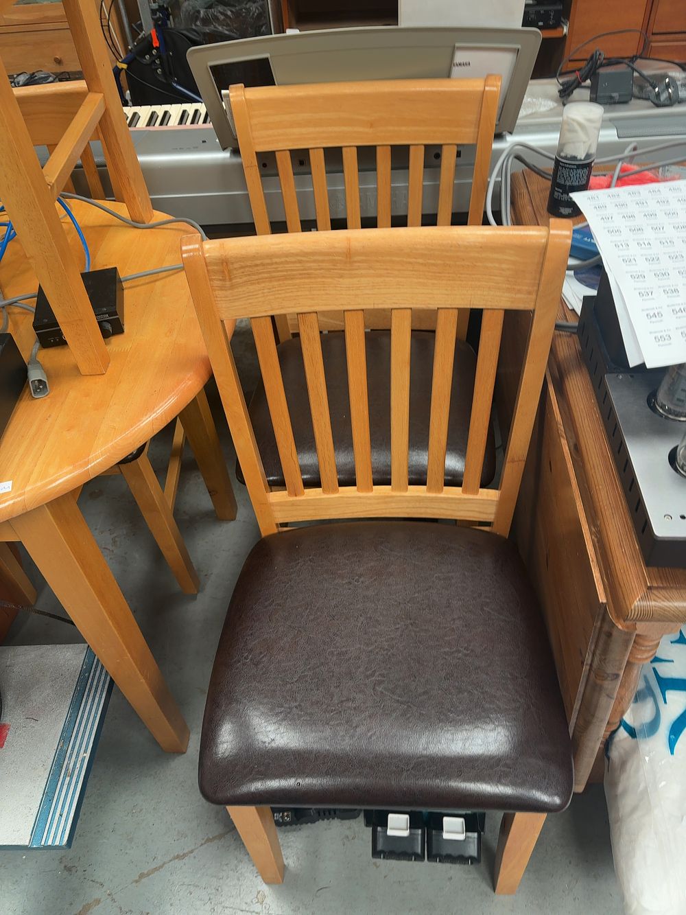 Lot 398: A Contemporary Hardwood Dining Suite comprising a Circular...