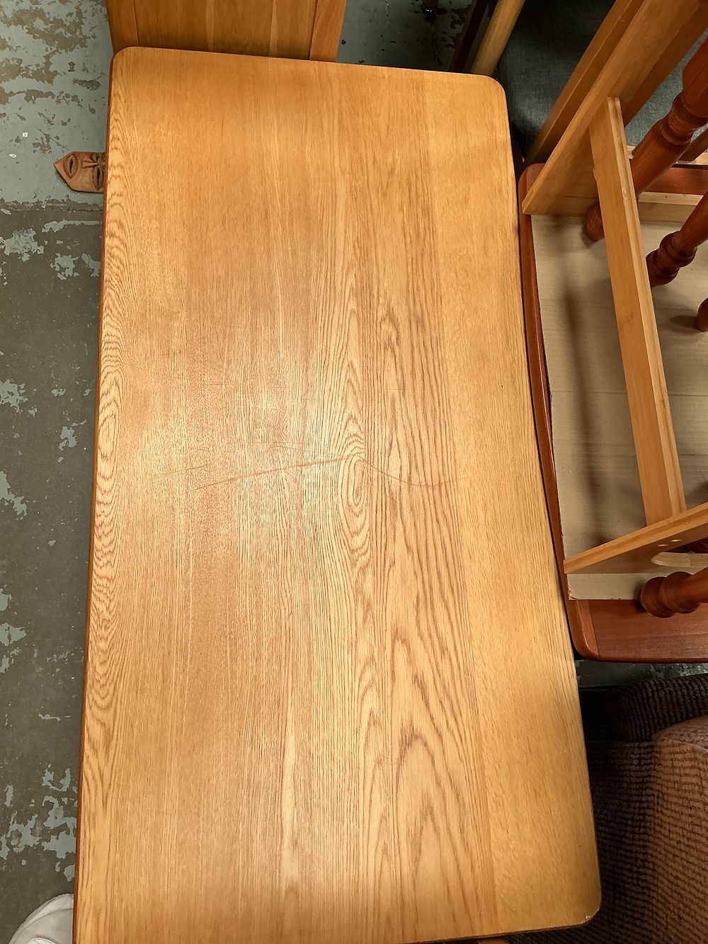 Lot 428: A contemporary light oak coffee table with two...