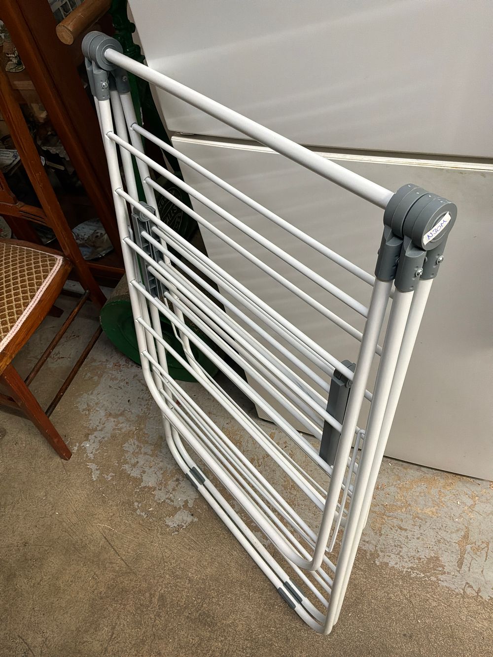 Lot 512: A Folding Metal and Plastic Winged Clothes Airer
