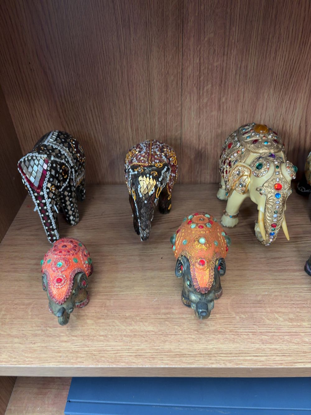 Lot 177: A Collection of Decorative Jewelled and Embellished Elephant Figurines in the Indian Ceremonial Style