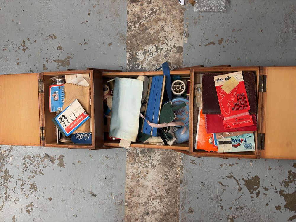 Lot 178: A Vintage Wooden Cantilever Sewing Box Containing a Collection of Haberdashery and Sewing Notions
