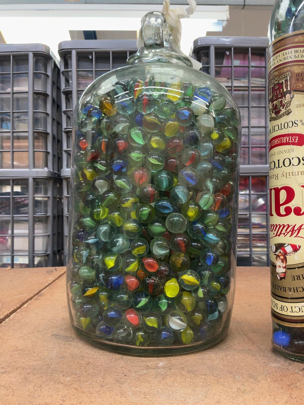 Lot 207: Two Large Glass Containers Containing a Substantial Collection of Vintage and Modern Glass Marbles