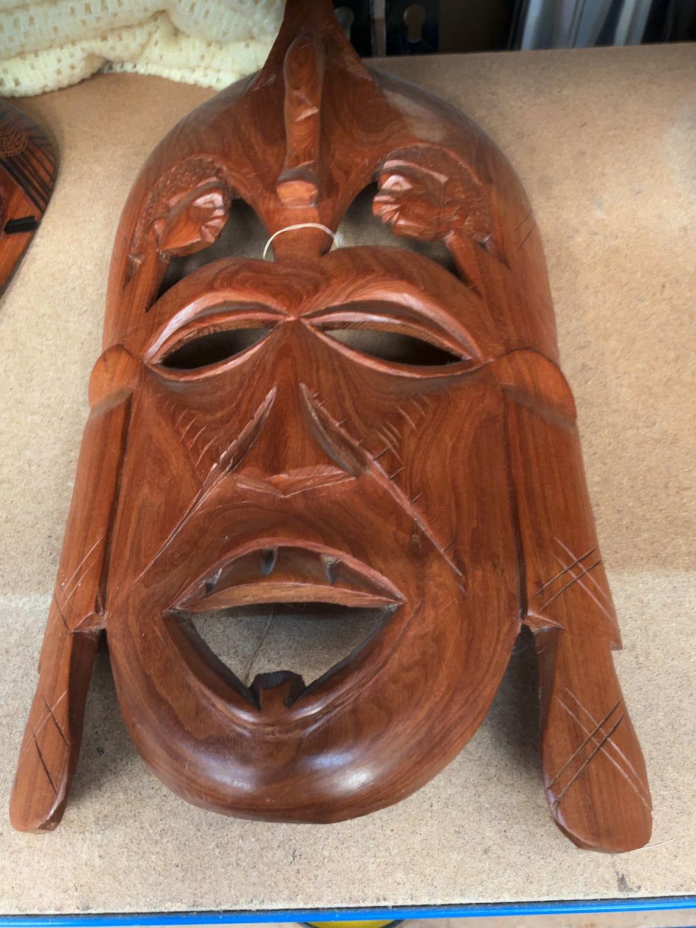 Lot 227: A Collection of Four African Hand-Carved Decorative Wooden Masks