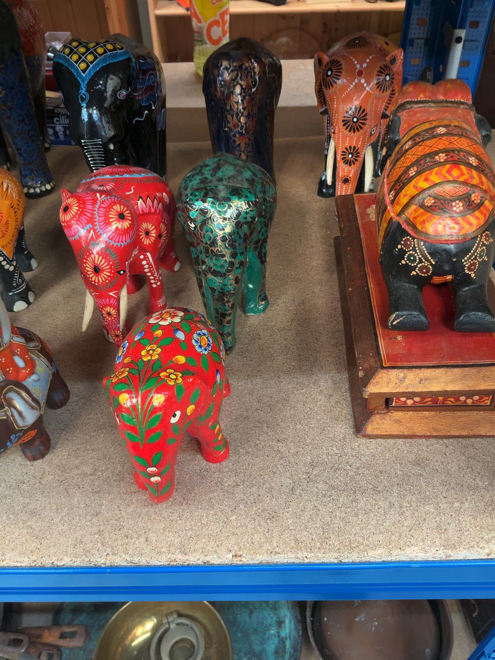 Lot 230: A Collection of Indian Painted Wood and Papier-Mache Elephant Figurines