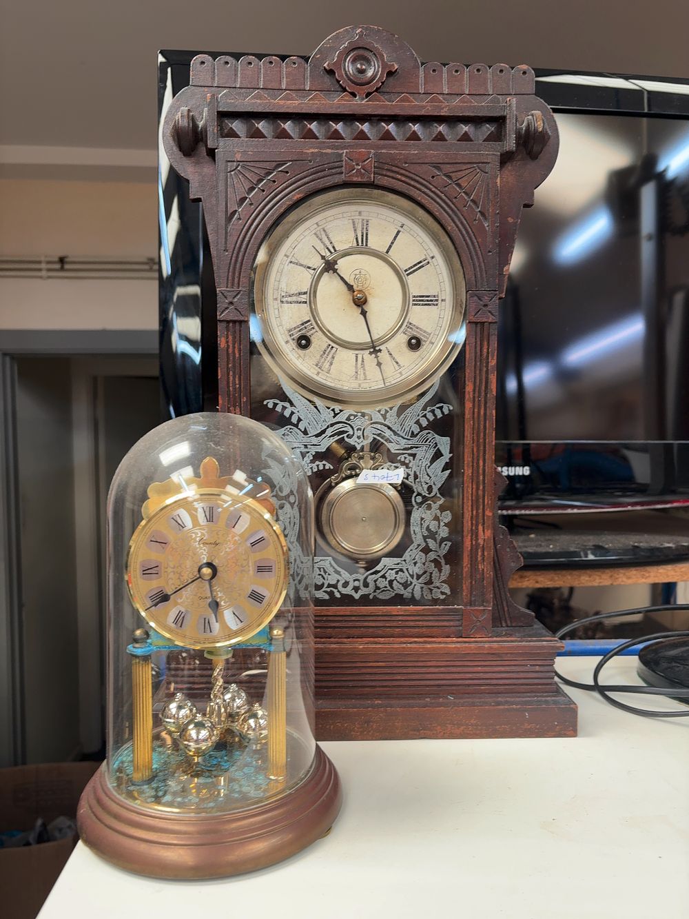 Lot 262: Two Clocks Including a Waterbury Mantel Clock and Anniversary Clock
