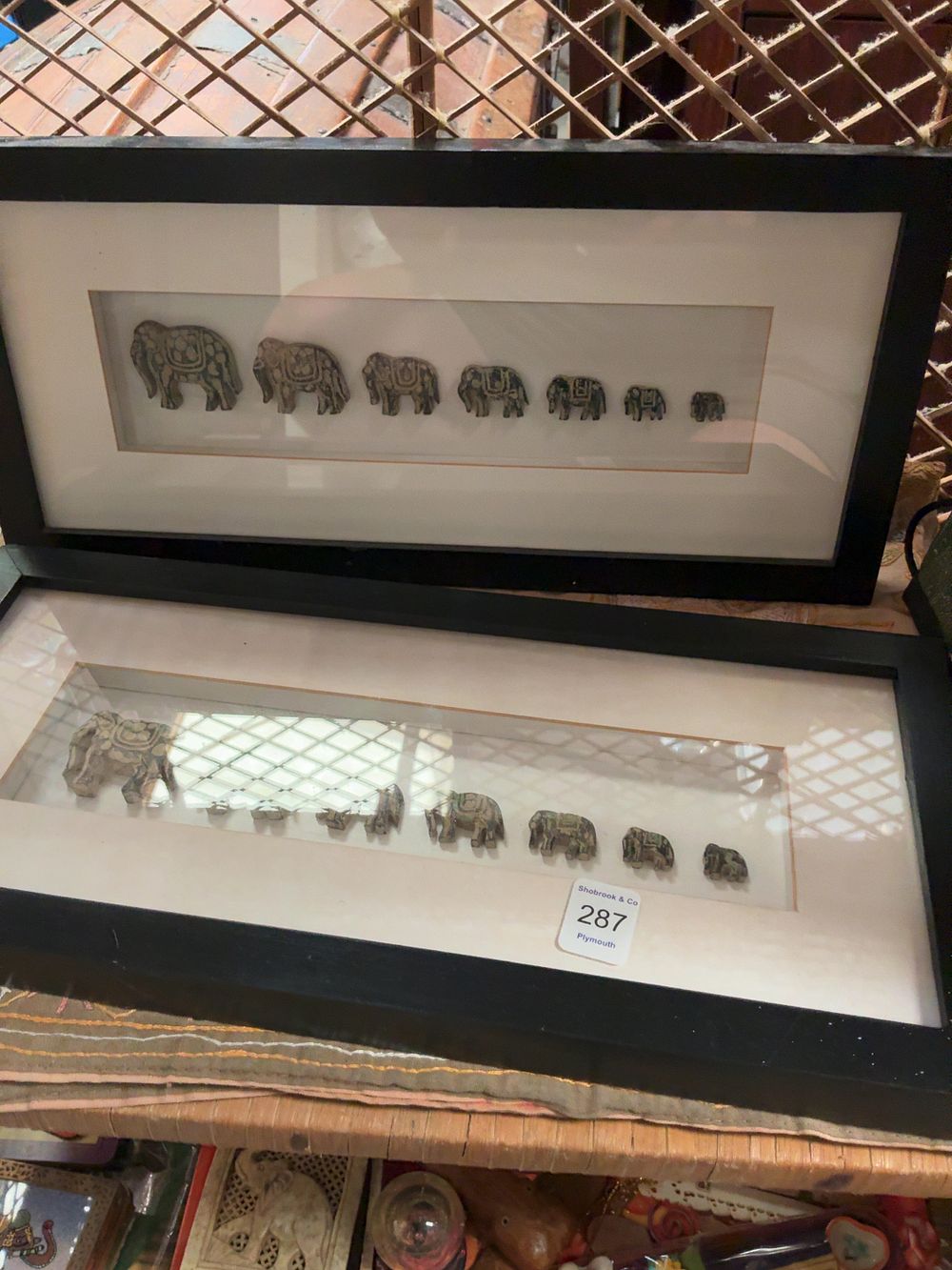 Lot 287: A Collection of South Asian Style Decorative Elephant Figurines and Wall Art