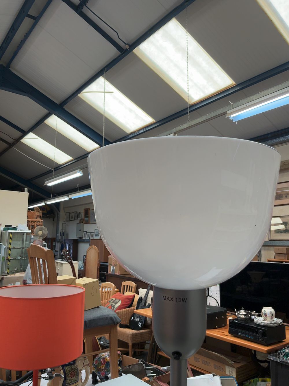 Lot 288: A Modern Silver-Toned Torchiere Floor Lamp with Translucent White Shade