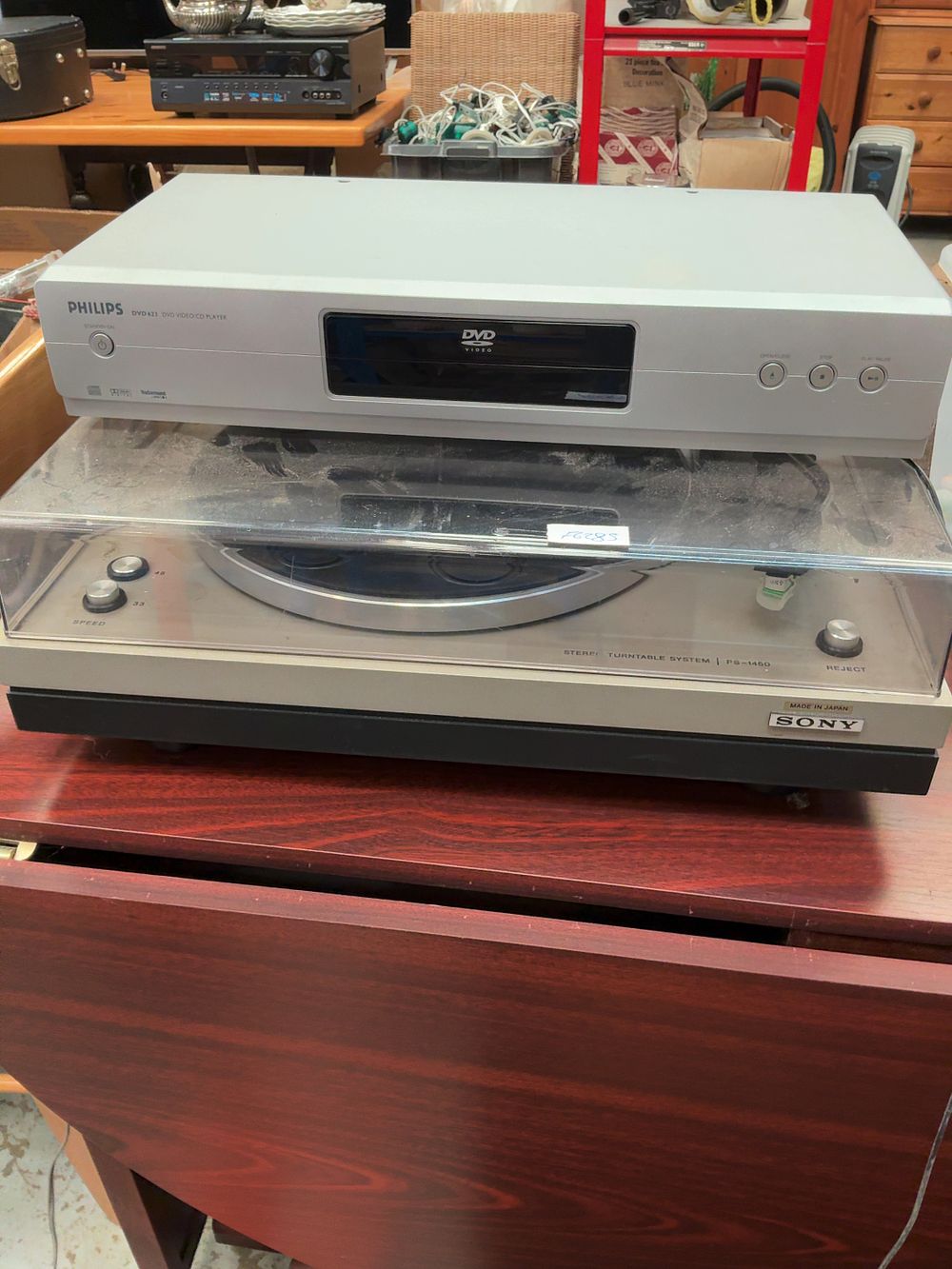 Lot 291: Two Home Audio Components Including a Sony PS-1450 Stereo Turntable System and a Philips DVD 623 Player