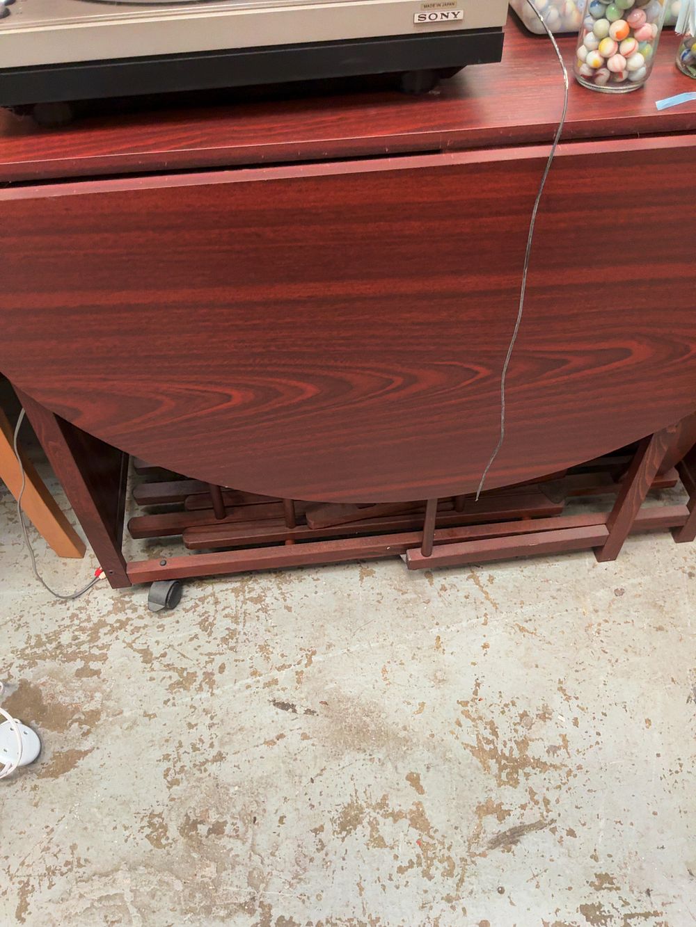 Lot 292: Mahogany-Effect Drop-Leaf Dining Table and Folding Chairs.