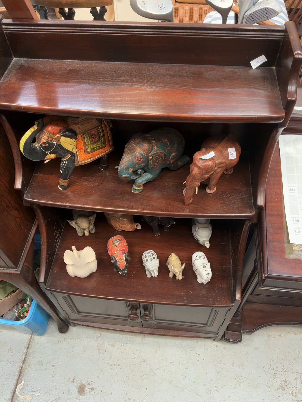 Lot 299: A 20th Century Dark Stained Wooden Shelving unit