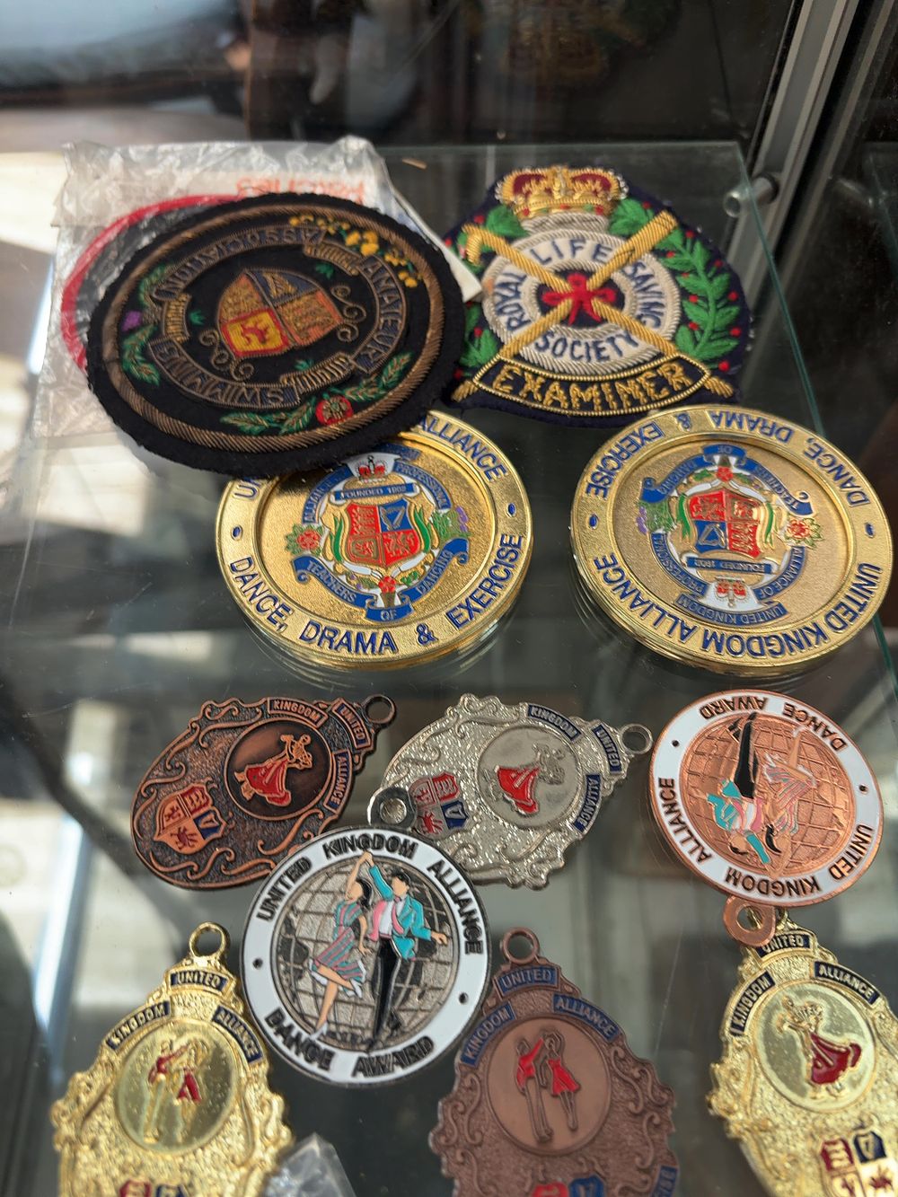 Lot 327: A Collection of United Kingdom Alliance Ballroom Dancing Medals and Achievement Patches