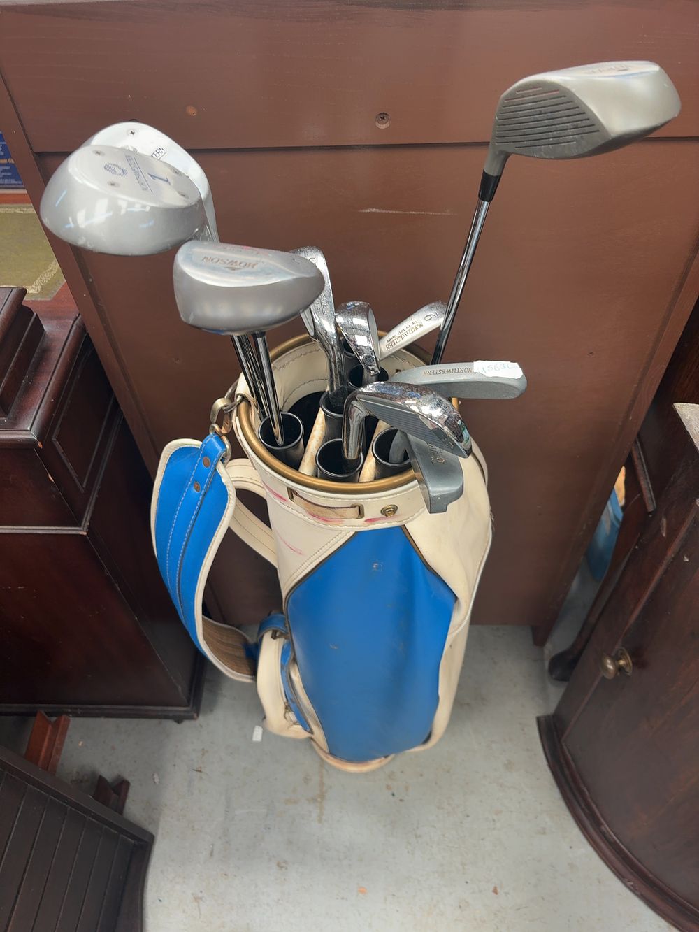 Lot 340: A Collection of Northwestern and Howson Vintage Golf Clubs and Bag