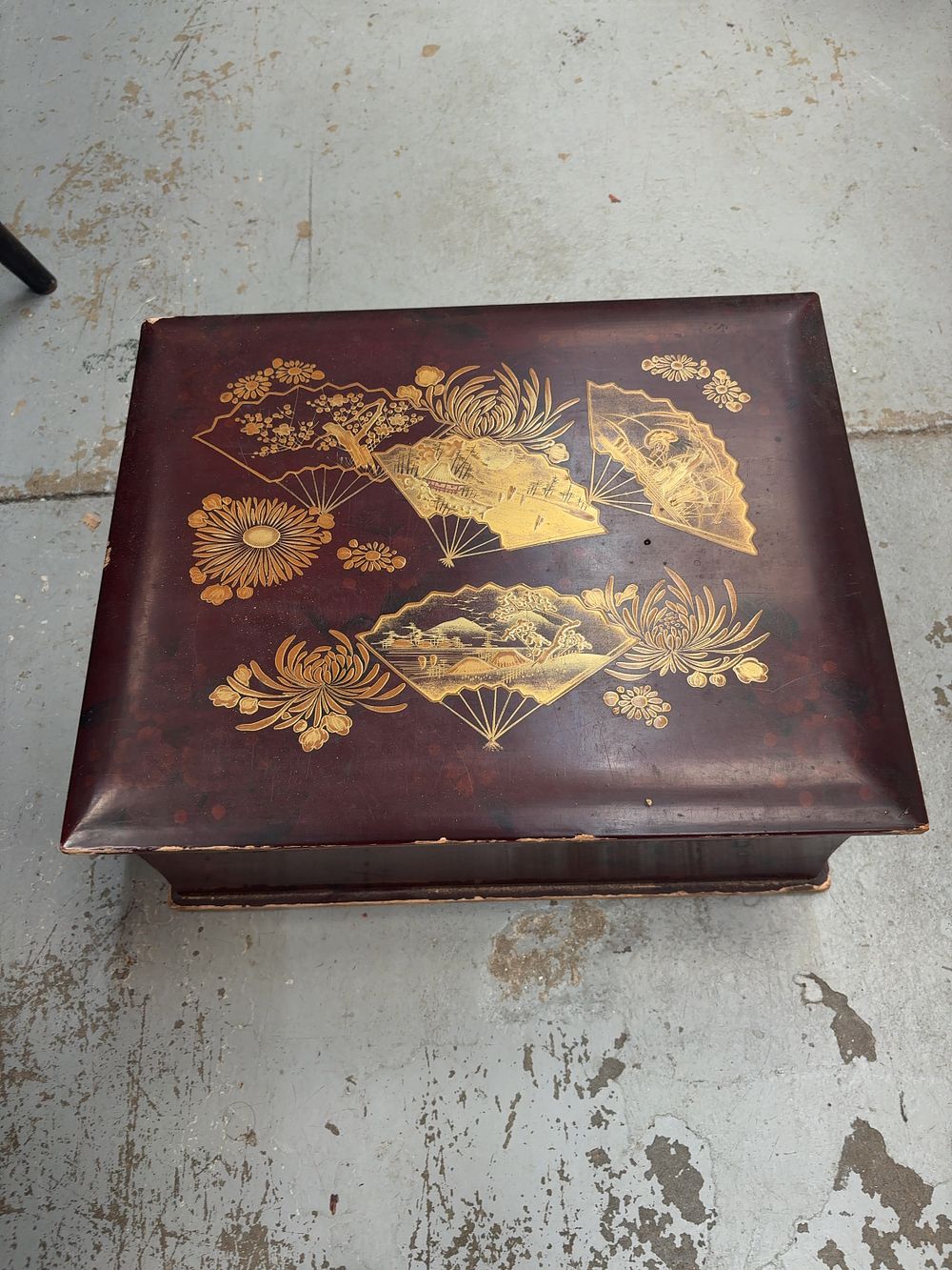 Lot 346: A Japanese Export Lacquer Stationery Box with Fan and Floral Decoration