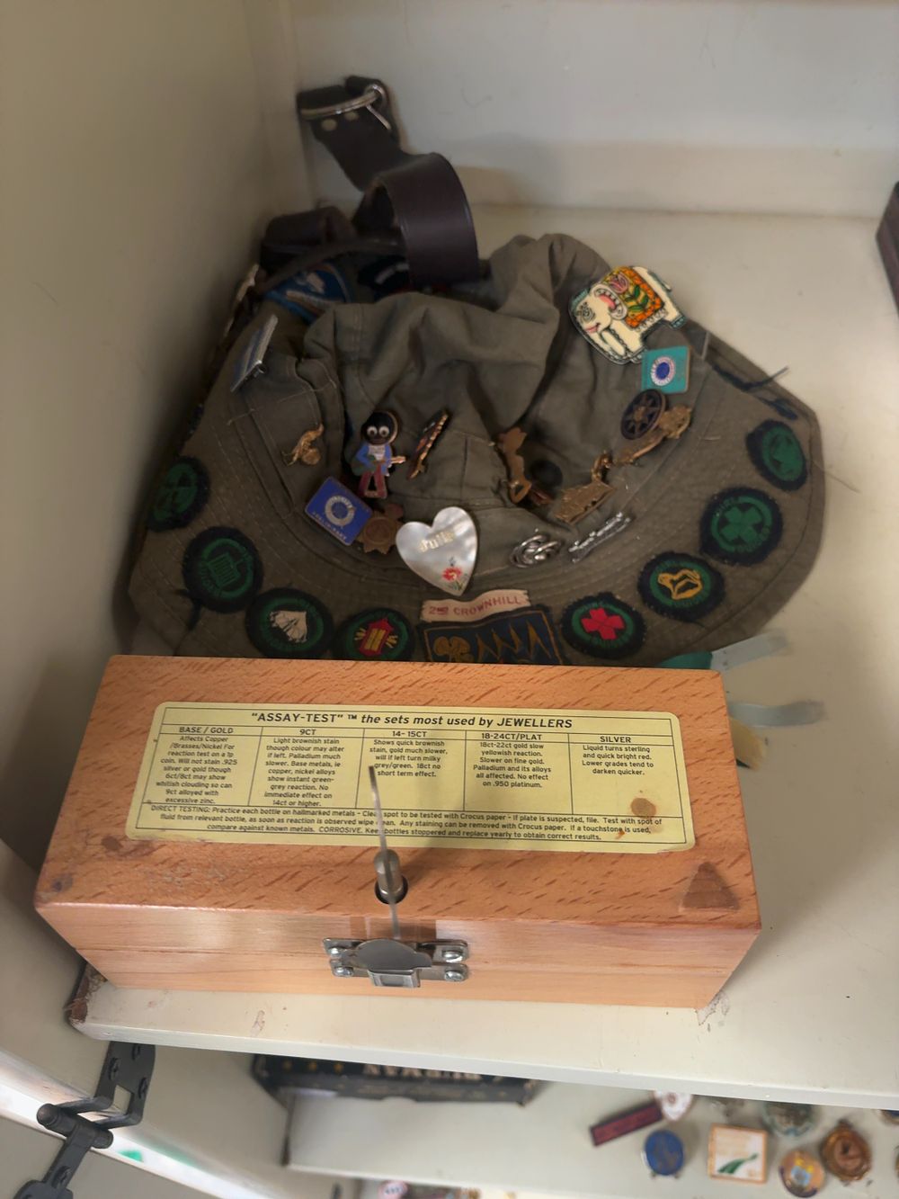 Lot 370: A Mid-20th Century Scout Souvenir Hat with Enamel Badges and a Professional Jeweller's Assay Test Kit