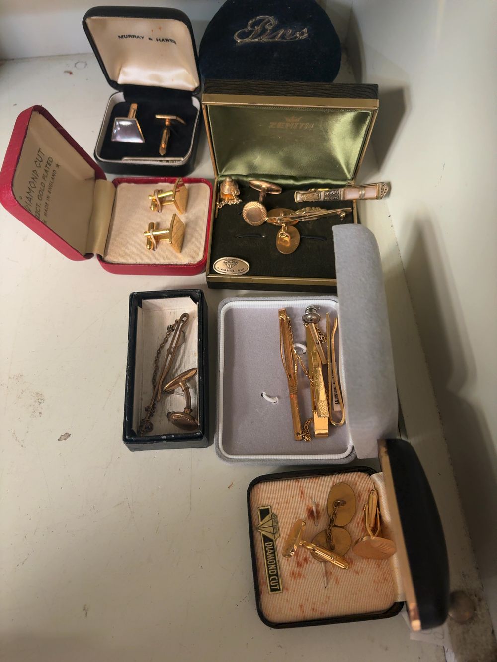 Lot 377: An Assortment of Vintage Gold Plated Mens Jewellery including Zenith and Diamond Cut Sets
