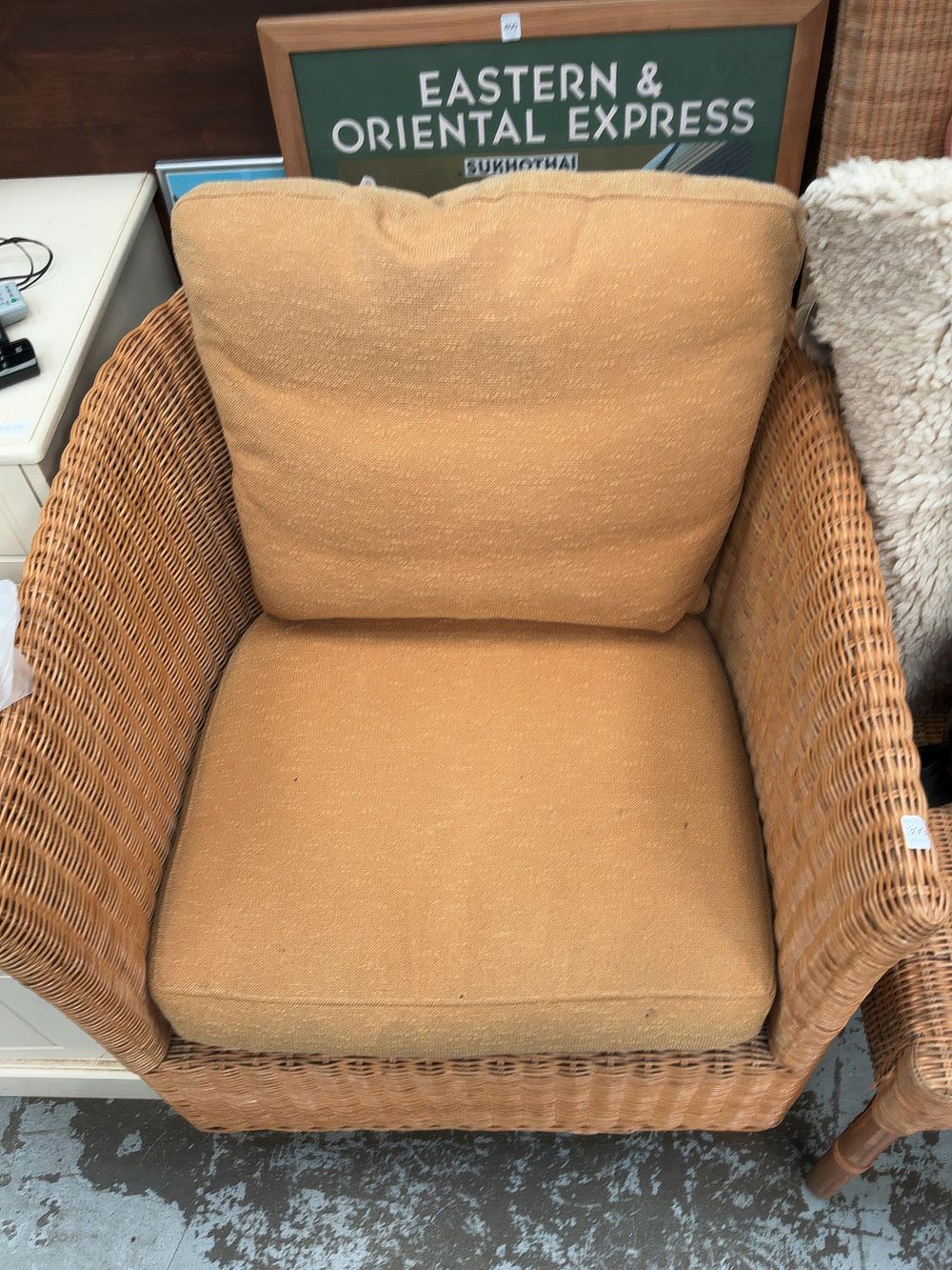 Lot 399: A Woven Rattan Conservatory Armchair