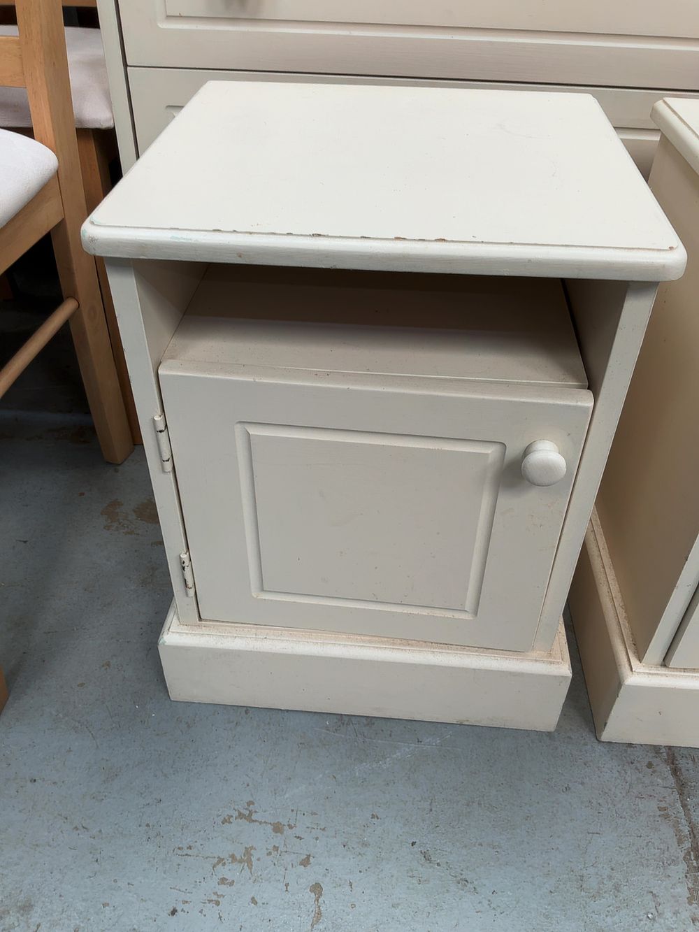 Lot 403: A Three-piece Painted Bedroom Suite comprising a Chest of Drawers and a Pair of Bedside Cabinets