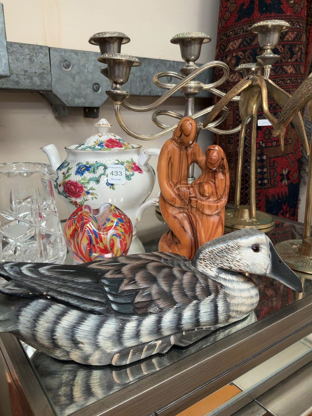 Lot 433: A Collection of Decorative Items including a Hand-Painted Duck Decoy, Porcelain Teapot, and Glassware