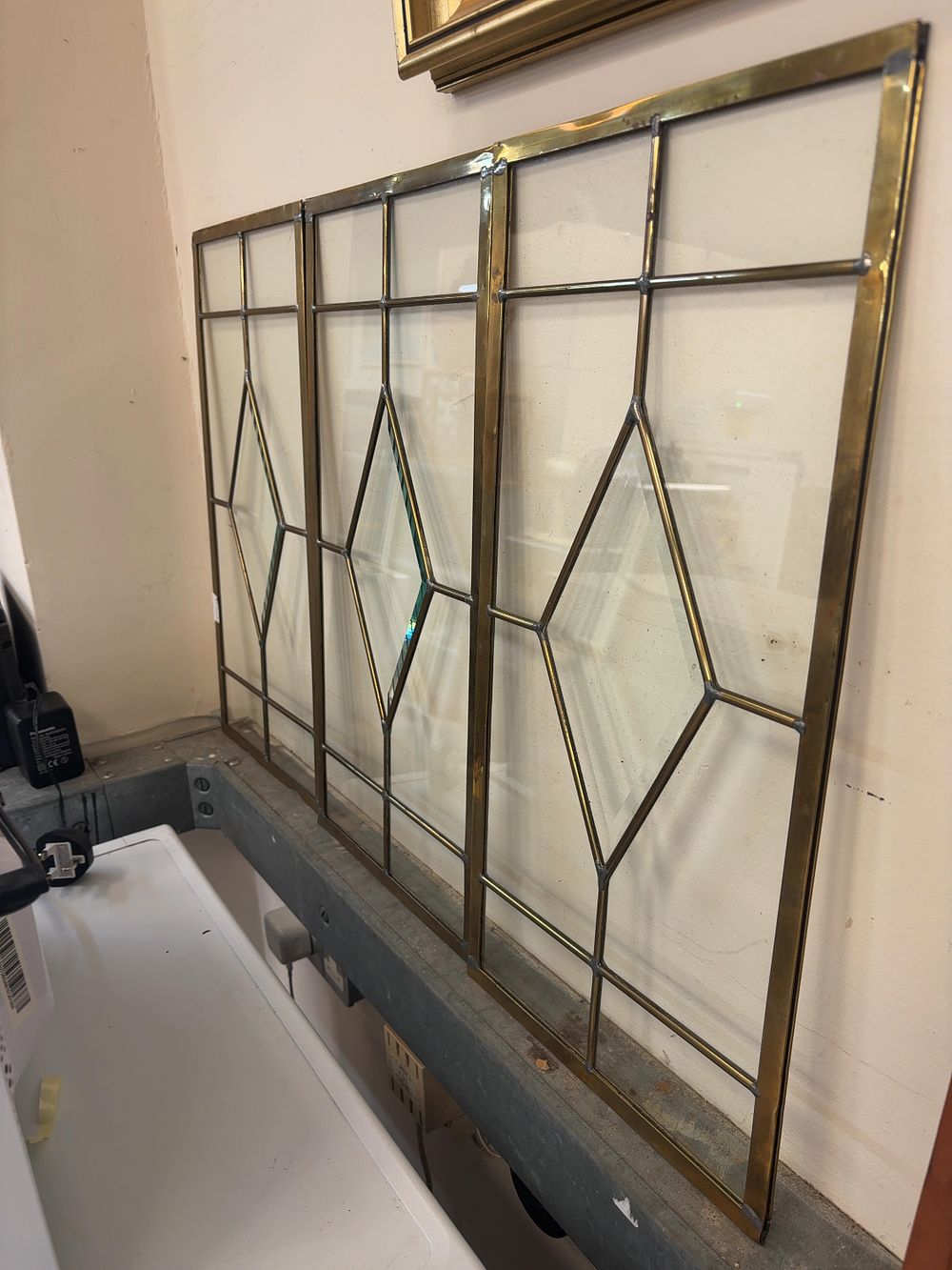 Lot 462: Three Leaded Clear Glass Architectural Panels with Brass-Toned Cames
