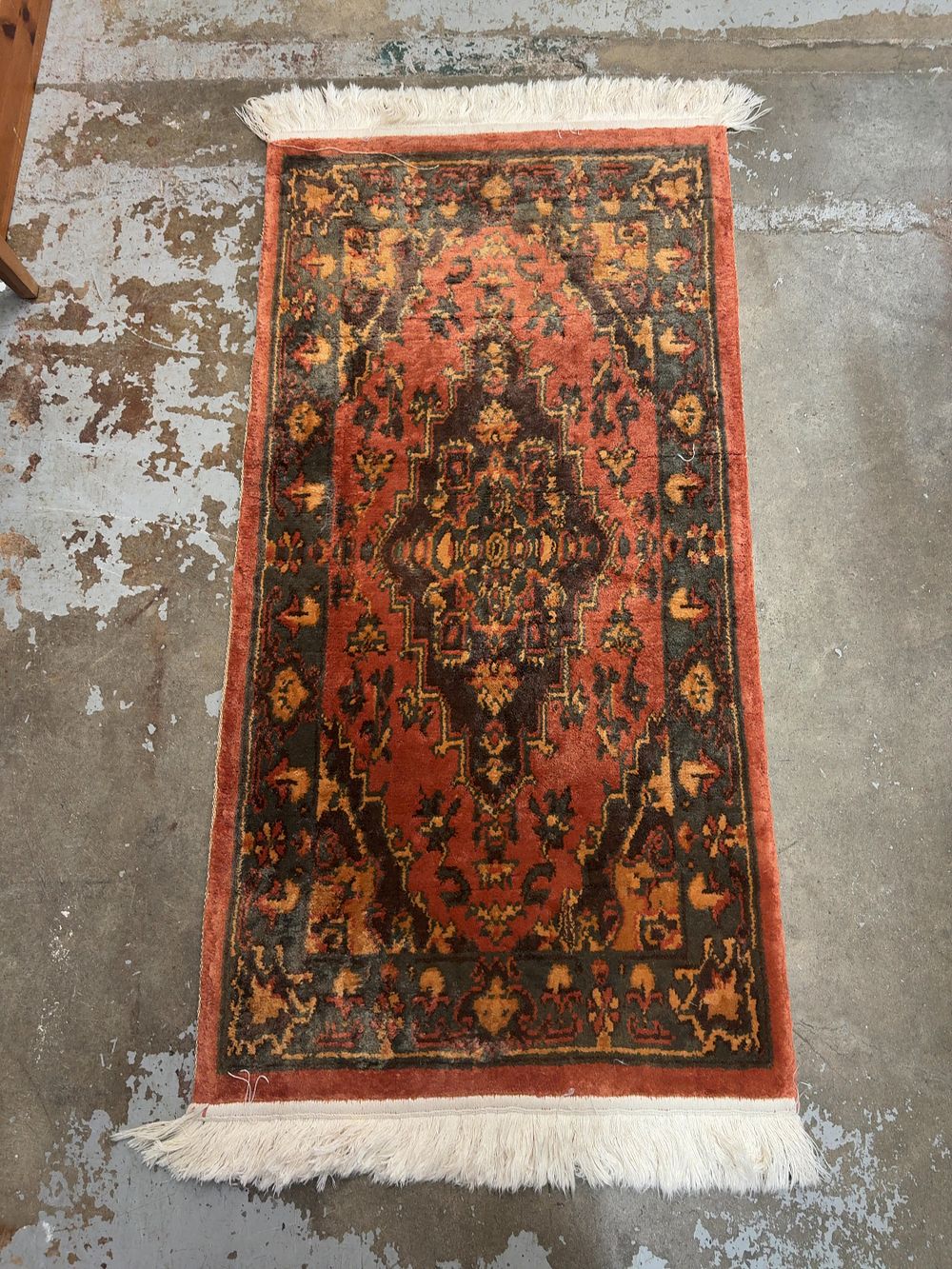 Lot 484: Two Traditional Style Rugs Including a Terracotta Geometric Area Rug and a Red Persian Style Hallway Runner
