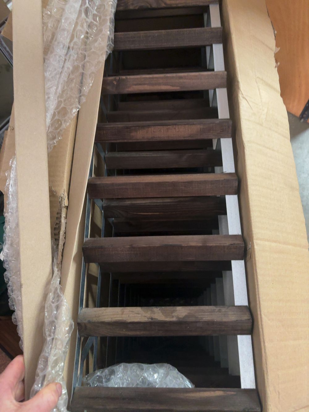 Lot 487: A Granville Classic 72-Bottle Dark Oak Stained Wood and Galvanised Metal Wine Rack