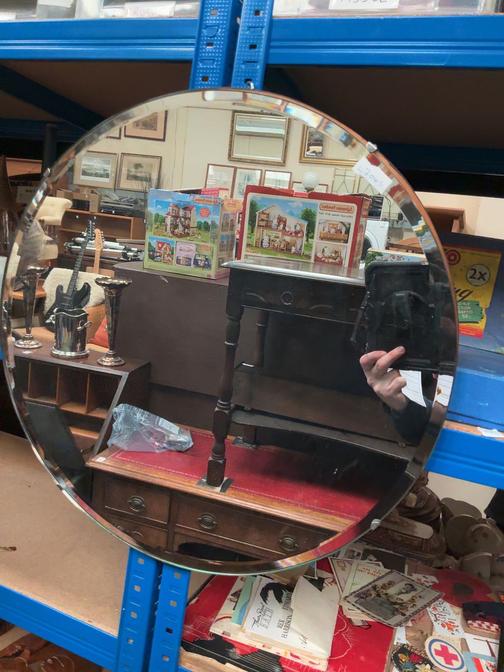 Lot 222: A Mid-20th Century Art Deco Style Circular Frameless Wall Mirror