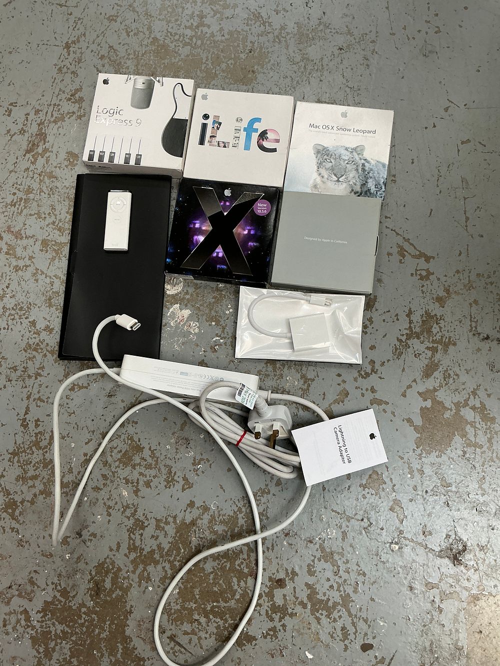 Lot 109: An Assortment of Apple Software and IT Accessories
