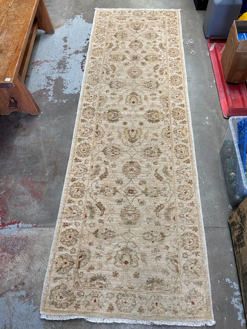 Lot 49: Hand-knotted wool runner rug in the Oushak style