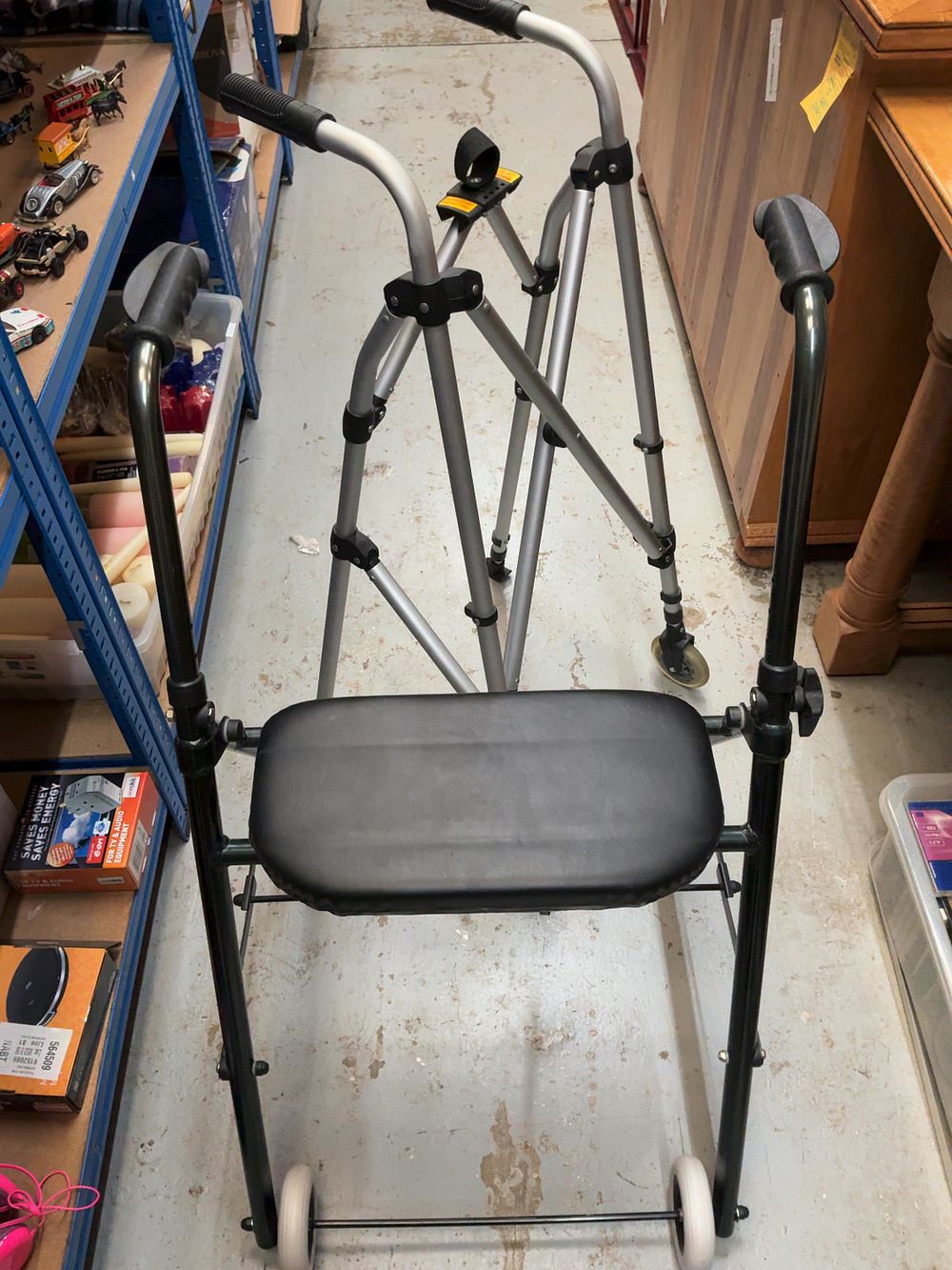 Lot 179: Two Mobility Walkers Comprising a Folding Three-Wheeled Tri-Walker and a Two-Wheeled Walker with Seat