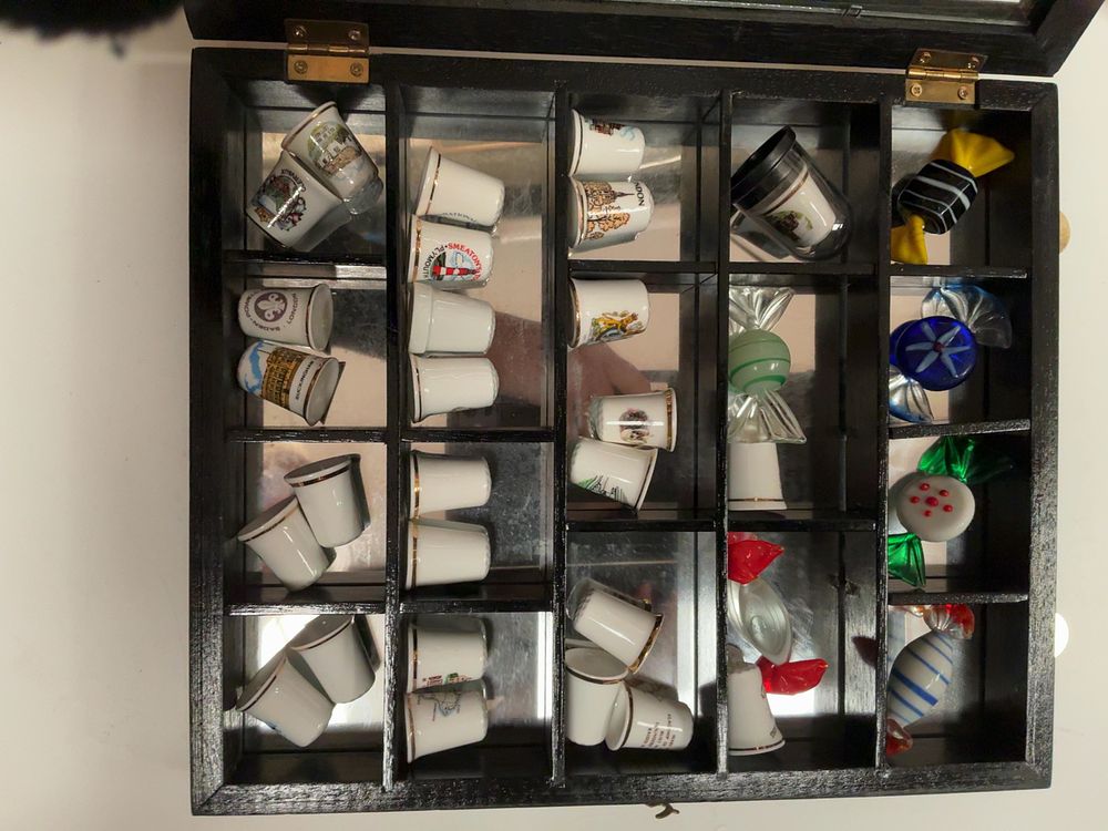 Lot 190: A Collection of Approximately 130 Bone China and Novelty Thimbles with Four Matching Mirrored Display Cases