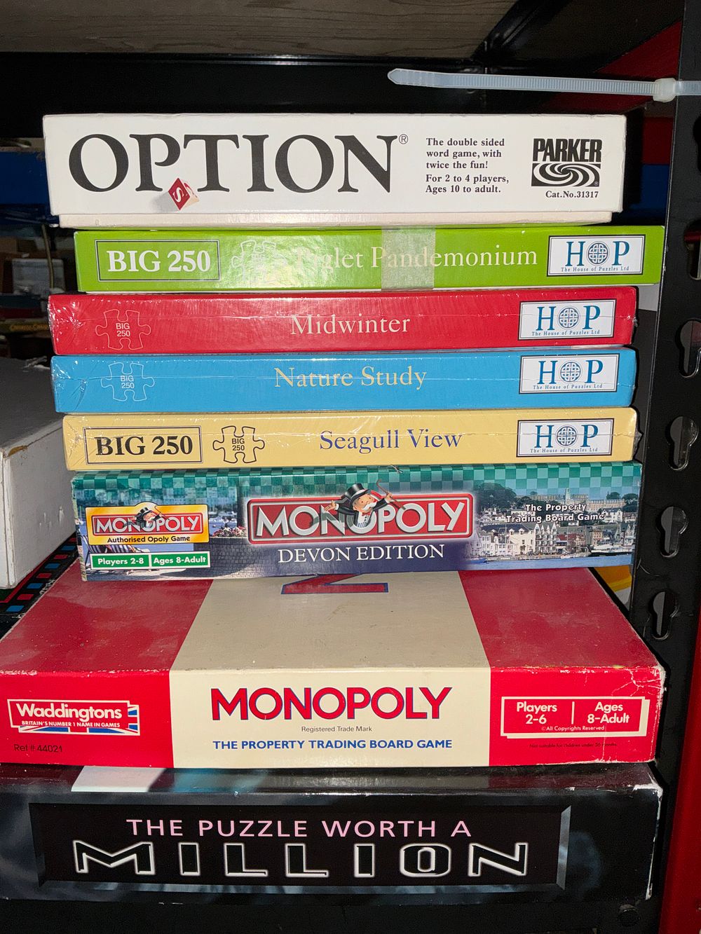 Lot 198: An Assortment of Vintage Board Games, Puzzles, and Electronic Handheld Games