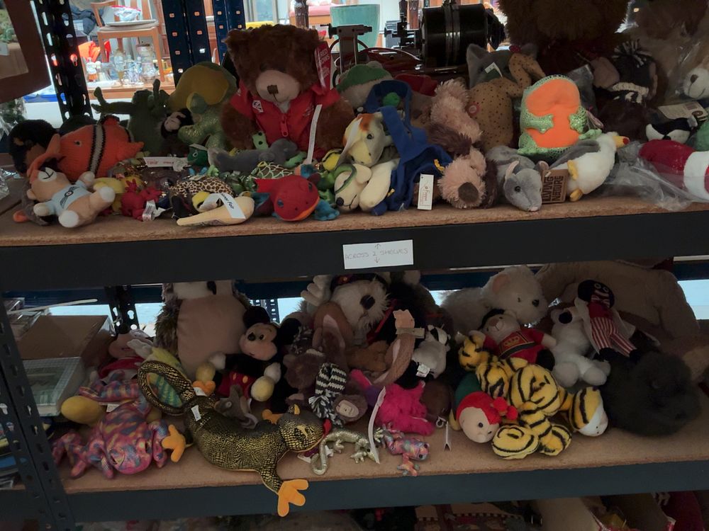 Lot 199: A Collection of Assorted Plush Toys and Hand Puppets including Disney, Ty, and The Puppet Company