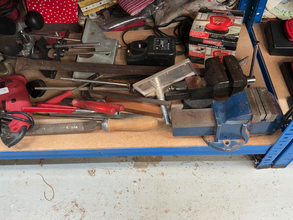 Lot 231: An assortment of Power Devil power tools, bench vises, and workshop hand tools