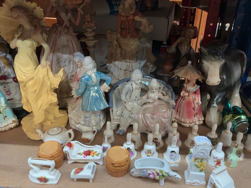 Lot 233: An Assortment of Decorative Porcelain and Ceramic Figurines, Animal Models, and Miniature Curios