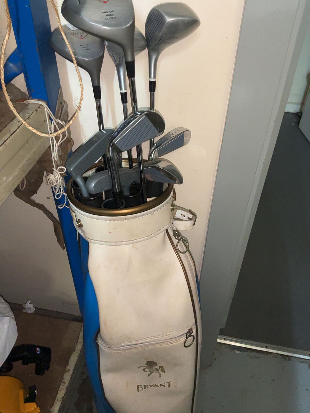 Lot 249: A Group of Vintage Golf Clubs by Northwestern, Howson, and Turfmaster in a Bryant Brand Bag