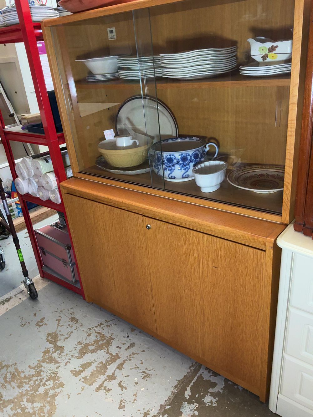 Lot 390: A Mid-Century Modern Style Teak-Veneered Two-Piece Display Cabinet