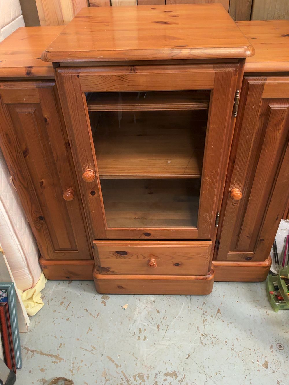 Lot 397: A late 20th-century knotted pine hi-fi media cabinet attributed to Ducal