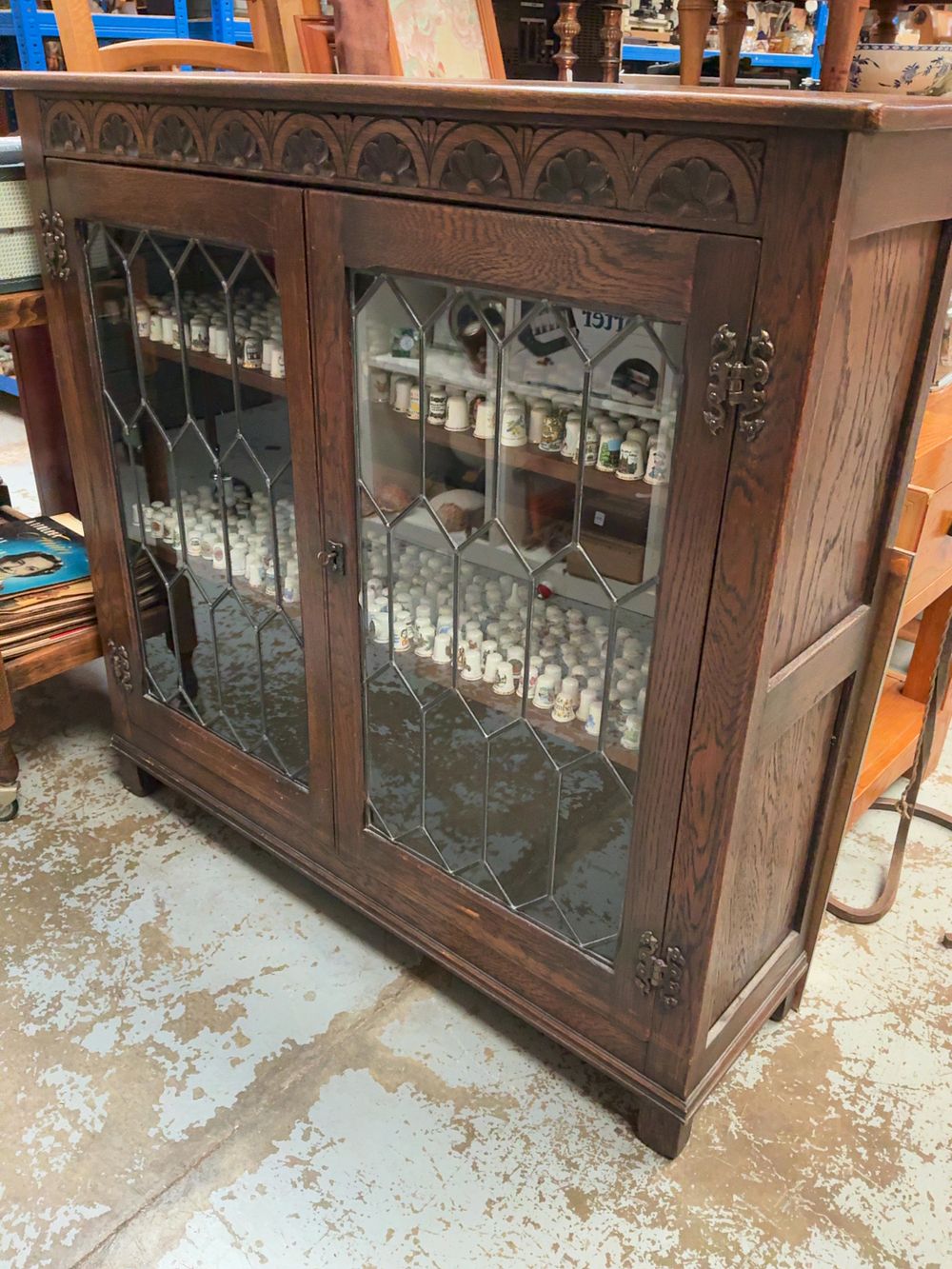 Lot 274: A 20th-century Jacobean style oak glazed display cabinet
