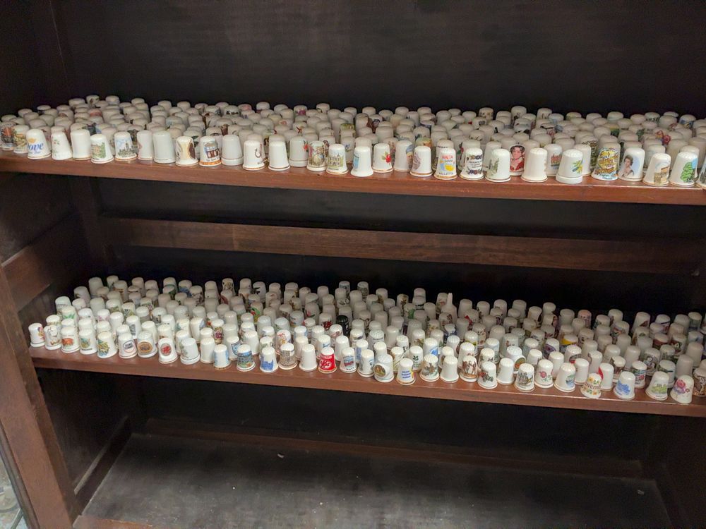 Lot 275: A Large Collection of Decorative and Souvenir Ceramic Thimbles