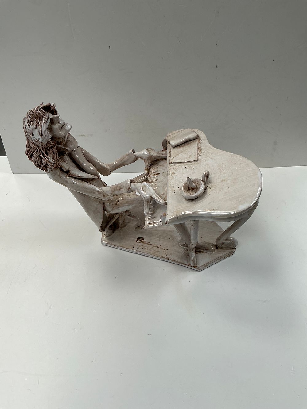 Lot 295: Dino Bencini, an expressionistic glazed terracotta sculpture of a pianist