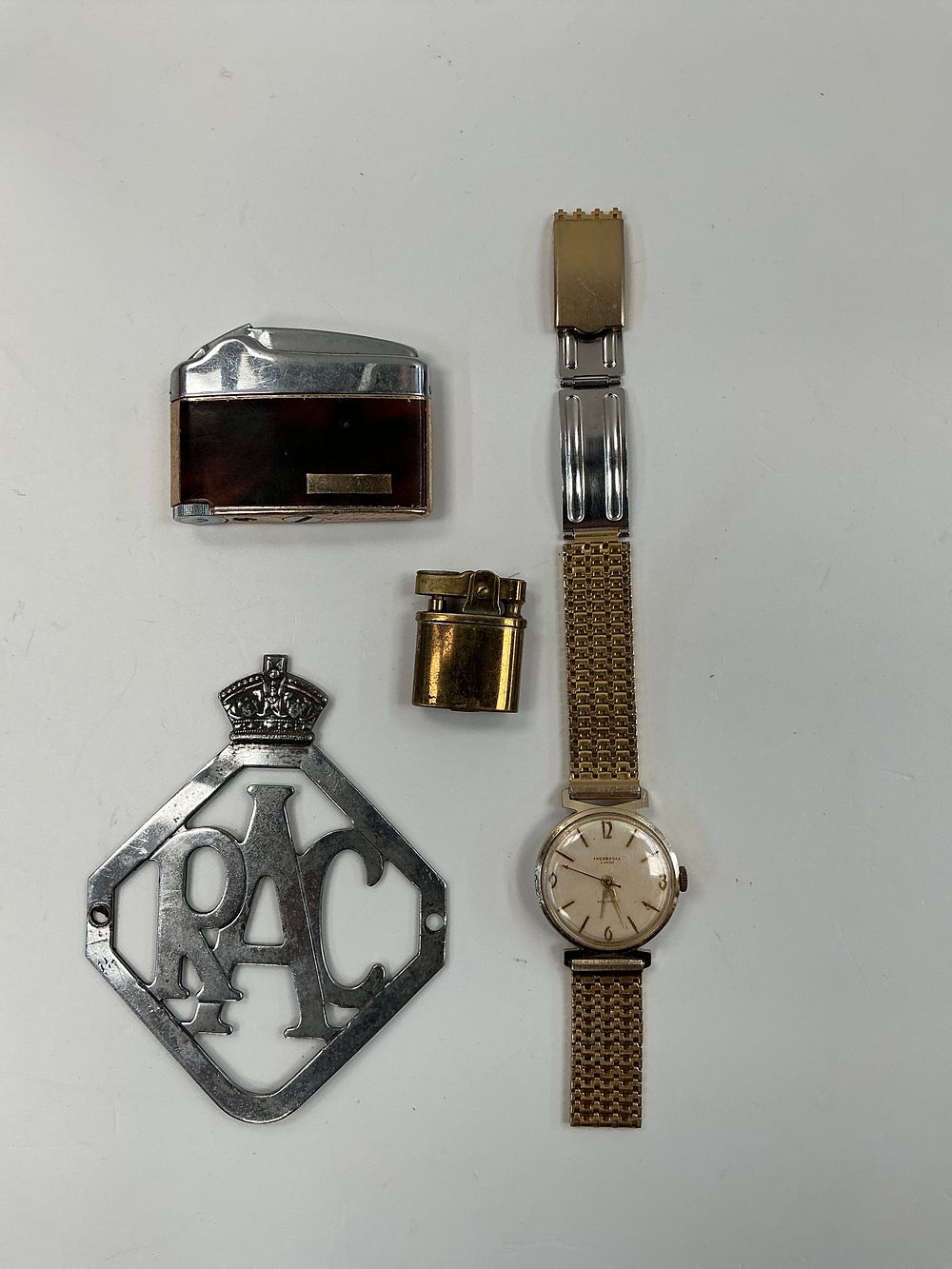 Lot 296: A Collection of Vintage Items including an Ingersoll Ladies' Wristwatch, Two Pocket Lighters and an RAC Car Badge Frame